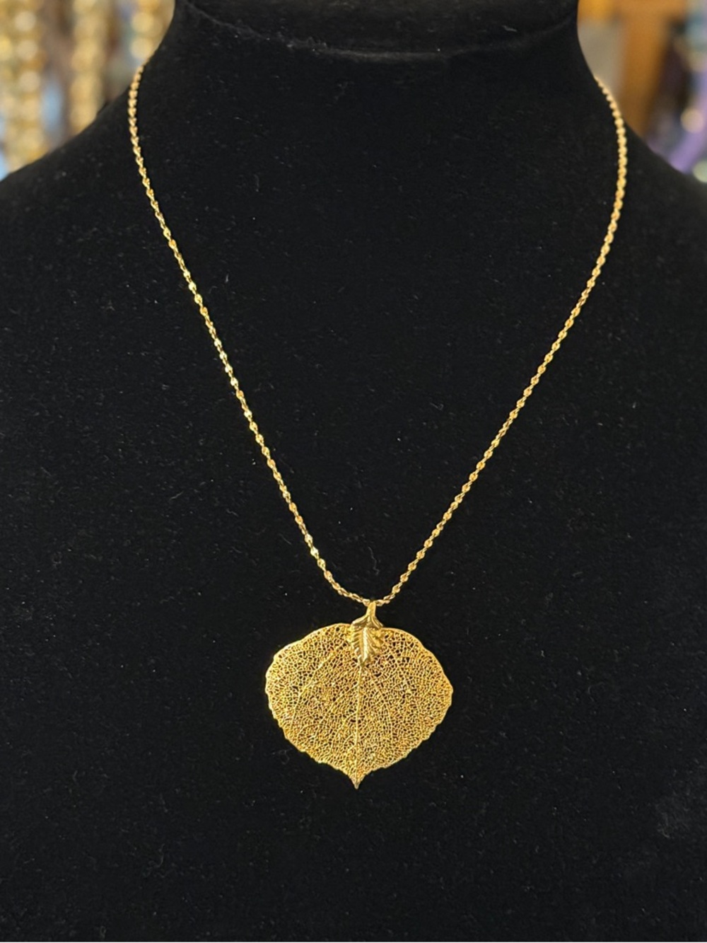 Gold Leaf Pendant Necklace AND Goldtone Oval Hoop Earrings